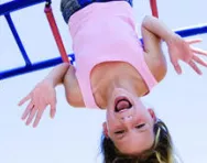 Girl on climbing frame Girl on climbing frame