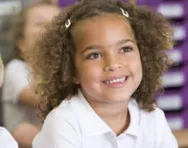 Girl smiling in class Girl smiling in class
