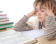 Girl struggling with reading