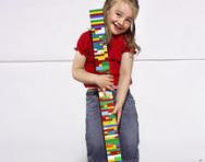 Girl with lego tower