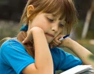 Girl reading and studying