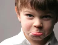 Little boy sulking Little boy sulking