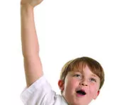 Little boy with hand up