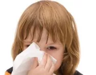 Little girl blowing her nose Little girl blowing her nose