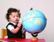 Little girl with globe