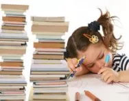 Little girl with stacks of books