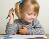 Little girl writing Little girl writing