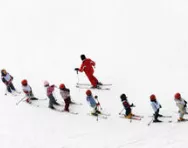 Lots of children skiing Lots of children skiing