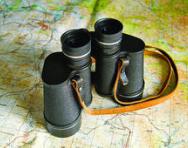 Map and binoculars