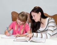 Mum and daughter studying