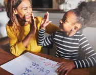 Parent and child doing maths