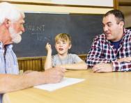 Parent, teacher and child meeting