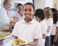 Pupil queuing for school meal 