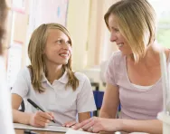 Pupil and teacher in class