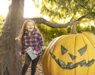 Child with pumpkin © Longleat