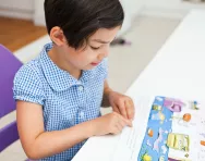 Reception child reading Reception child reading