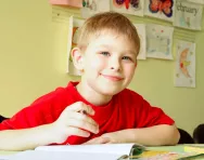 Child writing at home Child writing at home