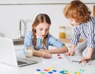Siblings doing homework