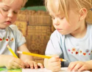 Sisters writing together