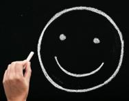 Smiling face on blackboard