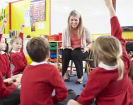 Teacher-children RE discussion in classroom