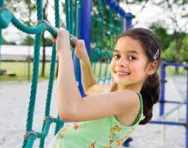 Child on climbing frame Child on climbing frame
