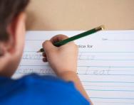 Child practising handwriting