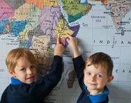Children looking at a map Children looking at a map