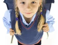 Girl in uniform with backpack Girl in uniform with backpack