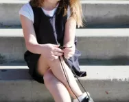 Little girl tying shoe laces Little girl tying shoe laces