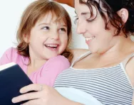 Mum and child reading together Mum and child reading together