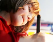 Reception child writing Reception child writing