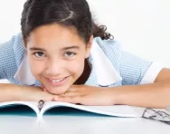 school girl lying on a book school girl lying on a book