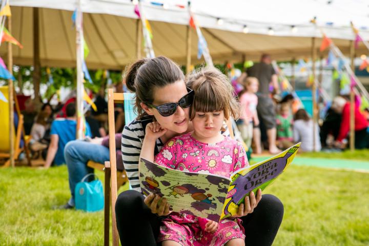 Mother and child reading at Hay Festival