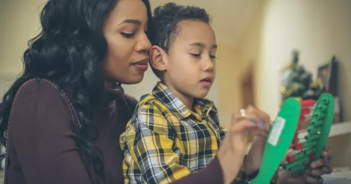 Mother and child practising maths skills