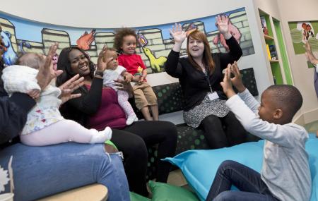 young children and parents playing 