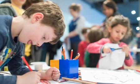 child colouring in at the Museum of London 